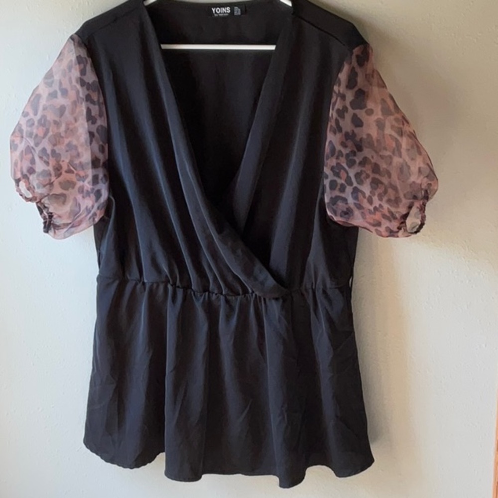 Black blouse with cheetah print sleeves